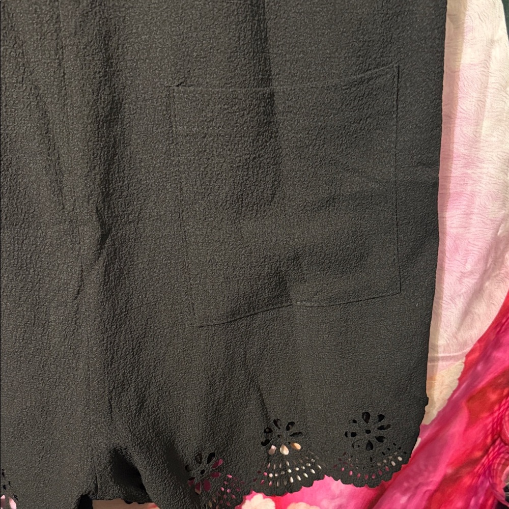 Sleeveless Romper w/laser cut hem at legs. 
2 pockets in front. - Picture 4 of 5